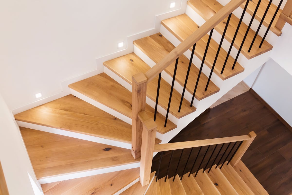 Modern wood staircase with contemporary design in white home
