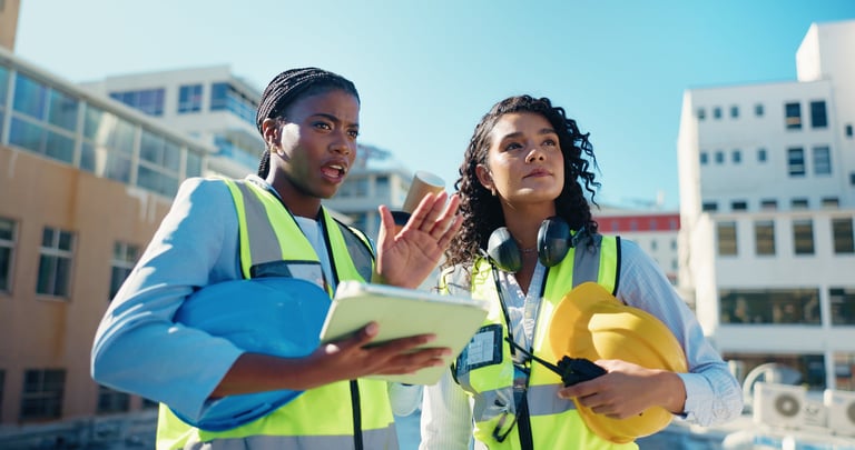 Architecture team inspecting construction site