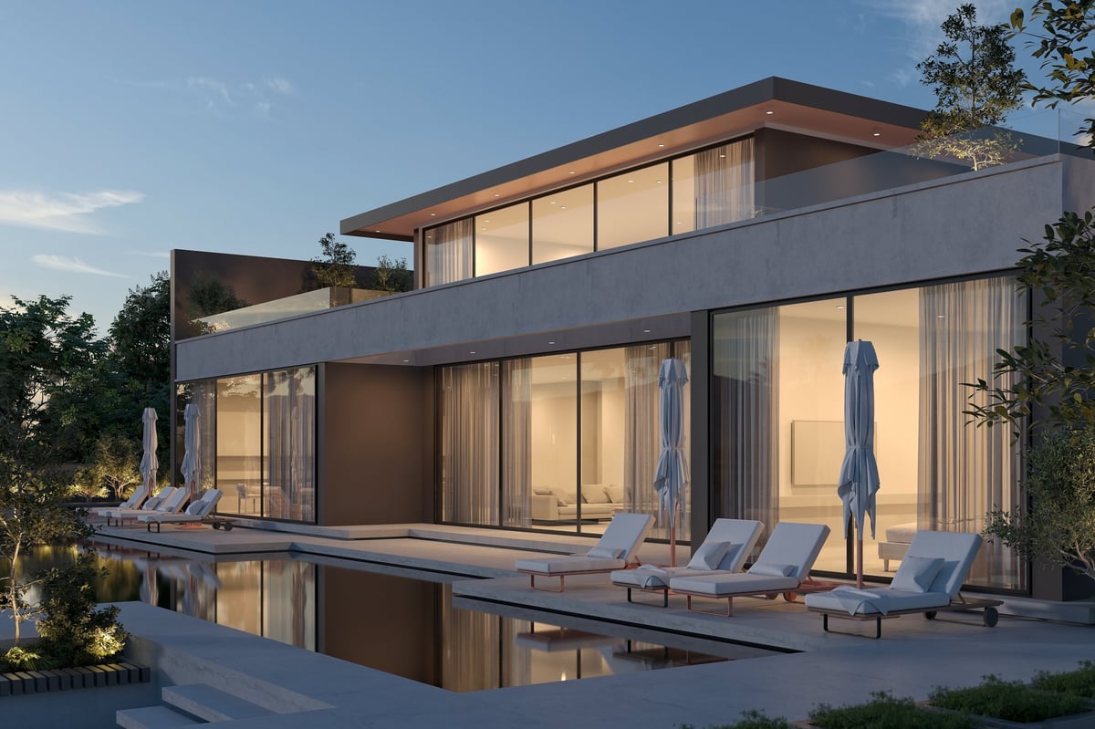 Luxury home exterior with clean vinyl windows and pool
